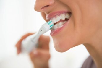 how to make an electric toothbrush quiet